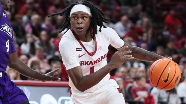 Razorbacks guard Keyon Menifield against Abilene Christian